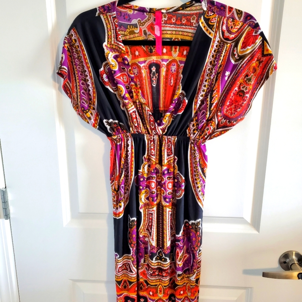 Multi colored dress. Light weight, stretch, and comfortable. Small. Gently used.
